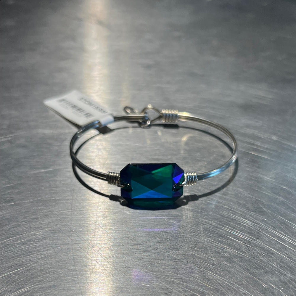 Silver Bangle Bracelet with Blue-Green Faceted Stone